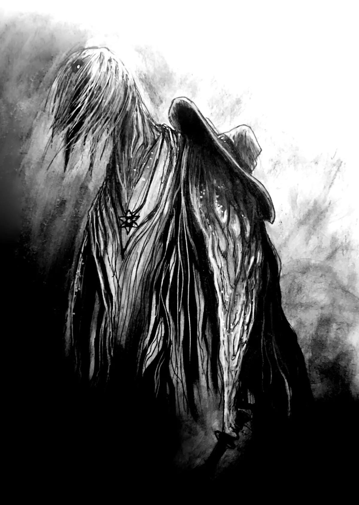 Un homme aux cheveux longs dont on voit pas le visage de coté tient un couteau